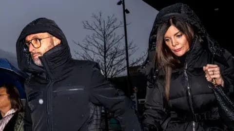 Jacques and Jessica Moretti arrive for a court hearing in Canton of Valais in Sion. 