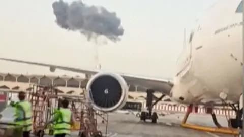 Smoke seen above planes at Dubai International Airport