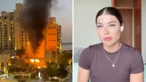 Splitscreen. Left, a hotel on fire. Right, a woman speaks to camera.