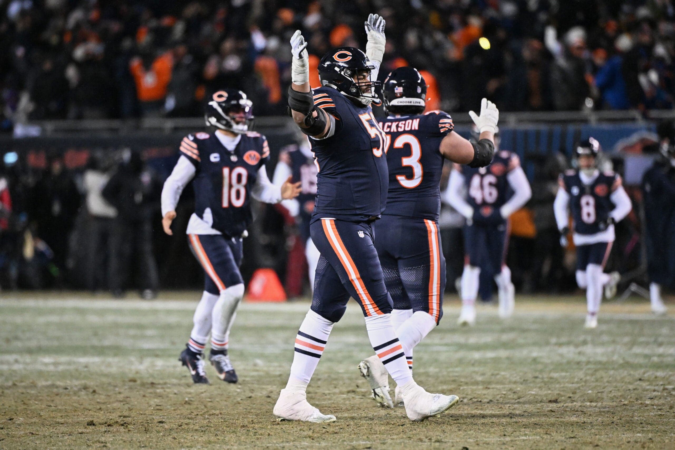 Jan 18, 2026; Chicago, IL, USA; Chicago Bears offensive tackle Darnell Wright (58) celebrates the game-tying extra point by placekicker Cairo Santos (not pictured) against the Los Angeles Rams with eighteen seconds remaining in the fourth quarter of an NFC Divisional Round game at Soldier Field.
