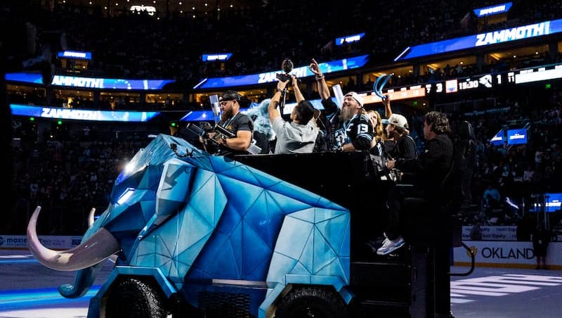 Tusky and fans cheer atop the Zammoth, a Mammoth-themed Zamboni for fans, as it is unveiled between the first and second periods of an NHL game between the Utah Mammoth and the Edmonton Oilers held at the Delta Center in Salt Lake City on Tuesday, April 7, 2026.