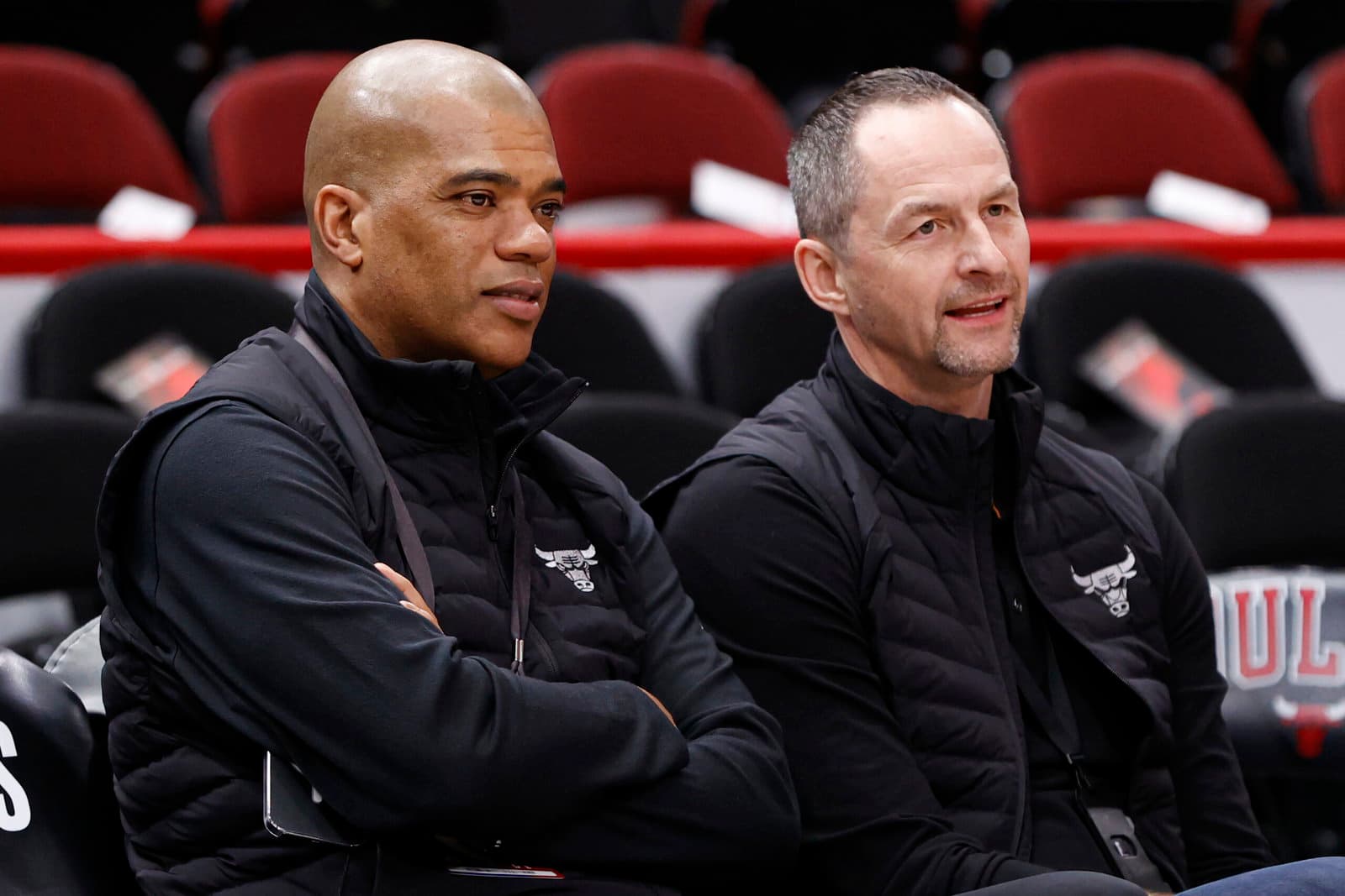 Apr 22, 2022; Chicago, Illinois, USA; Chicago Bulls executive vice president of basketball operations Arturas Karnisovas (right) talks with general manager Marc Eversley (left) before game three of the first round for the 2022 NBA playoffs against the Milwaukee Bucks at United Center. Mandatory Credit: Kamil Krzaczynski-USA TODAY Sports
