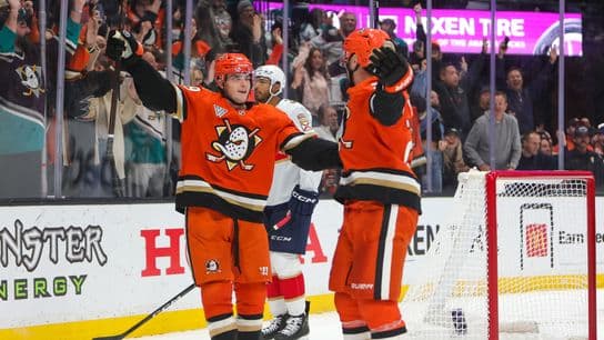 #19 RW Troy Terry and #20 LW Chris Kreider of the Anaheim Ducks celebrate a goal during an NHL game against the Florida Panthers on November 4, 2025 in Anaheim, CA.