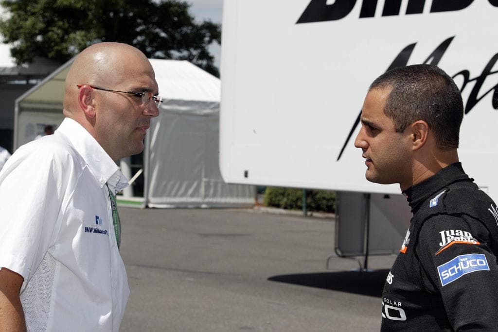 Ricard Huélamo y Juan Pablo Montoya, en el GP de Francia de 2005.