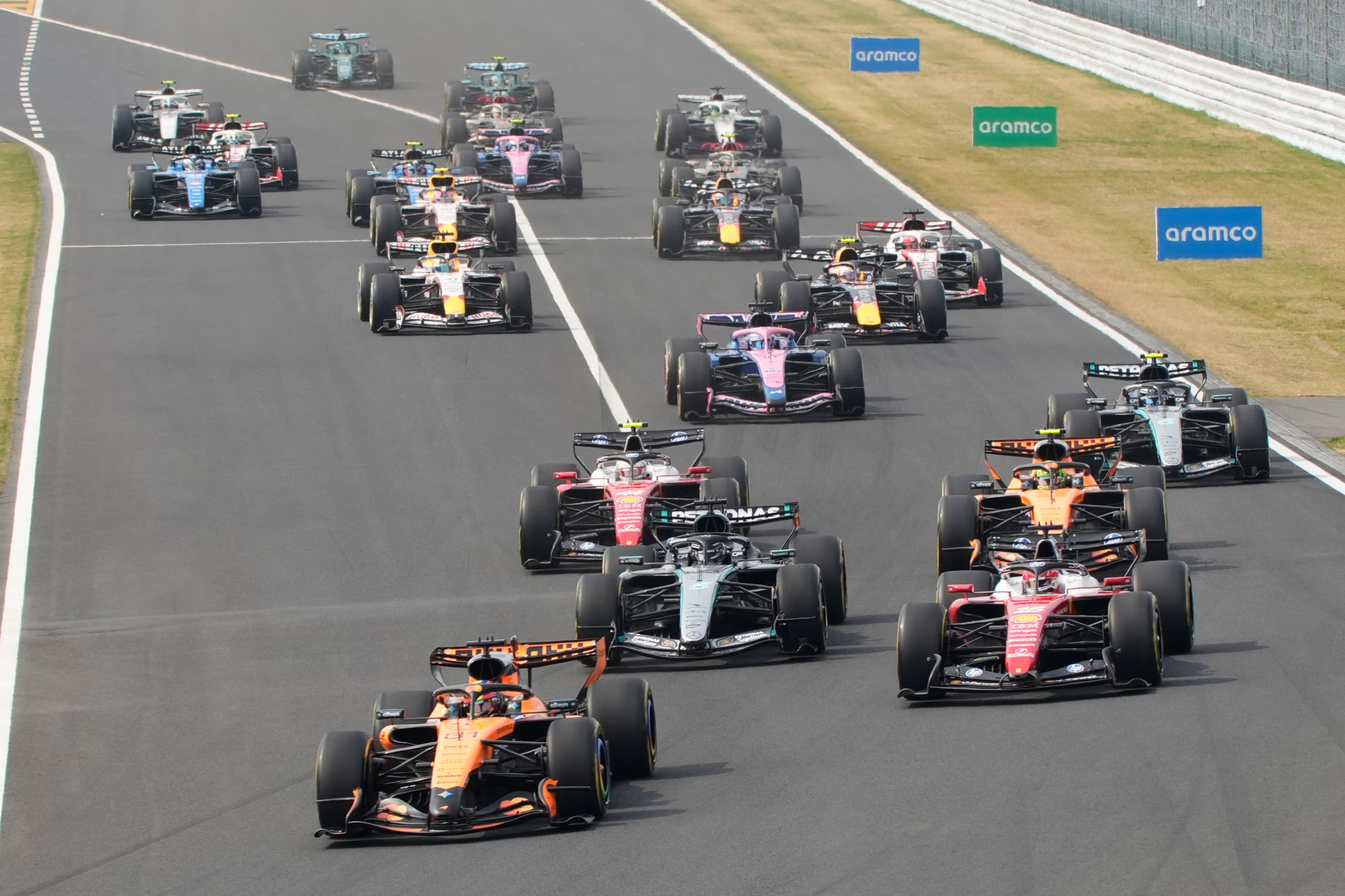 McLaren driver Oscar Piastri of Australia leads the field at the start of the Japanese Formula One Grand Prix at Suzuka in central Japan, Sunday, March 29, 2026. (AP Photo/Eugene Hoshiko)