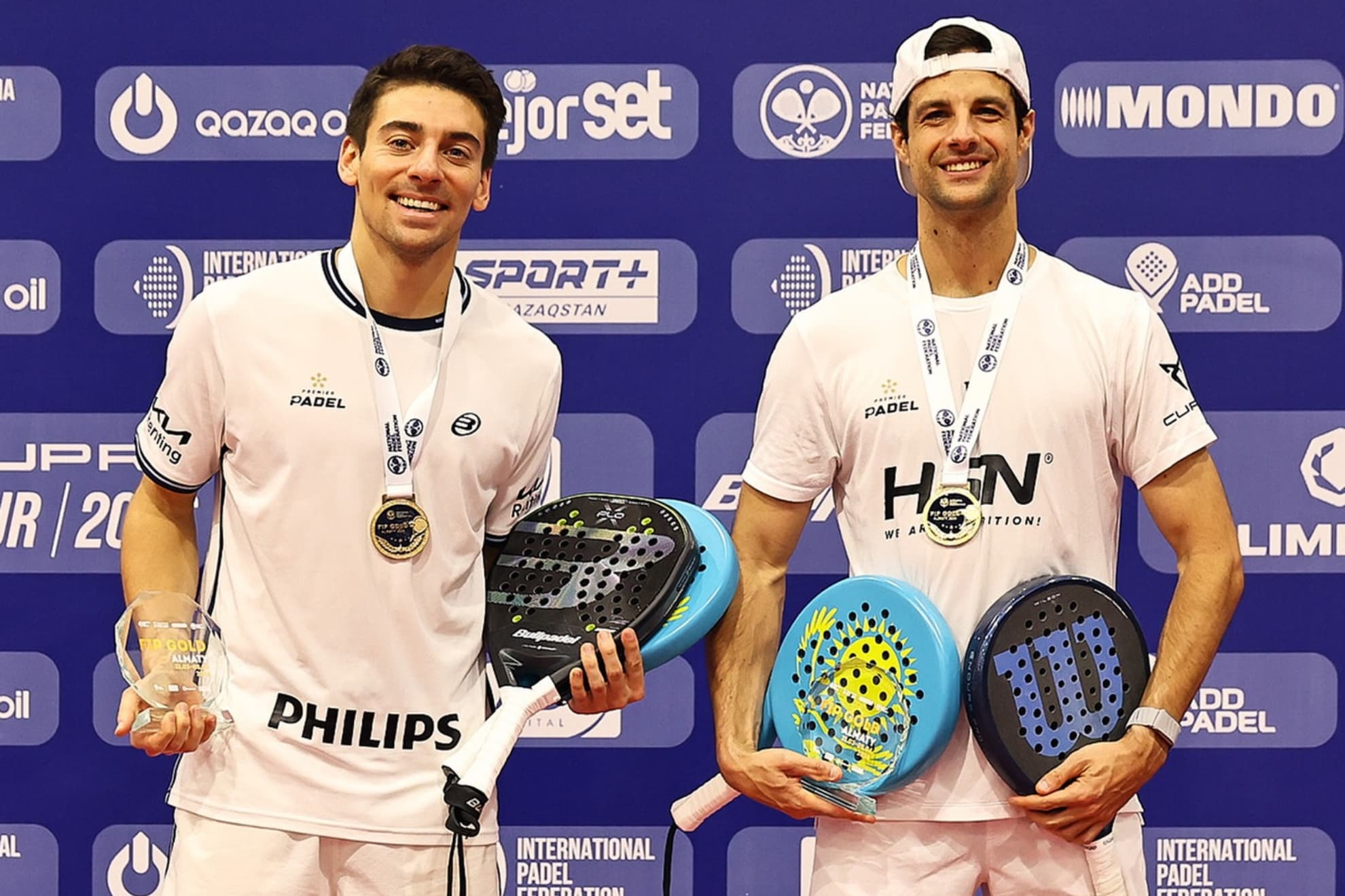 Martín Di Nenno y Momo González con el título del FIP Gold de Almaty.