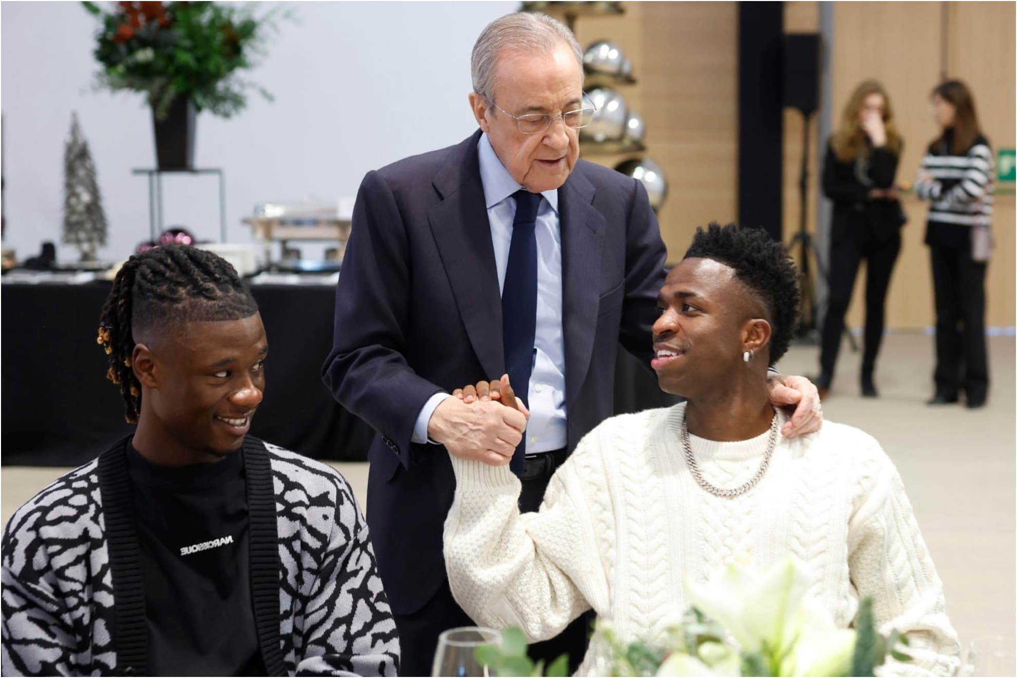 Florentino, con Vinicius y Camavinga durante la comida de Navidad.