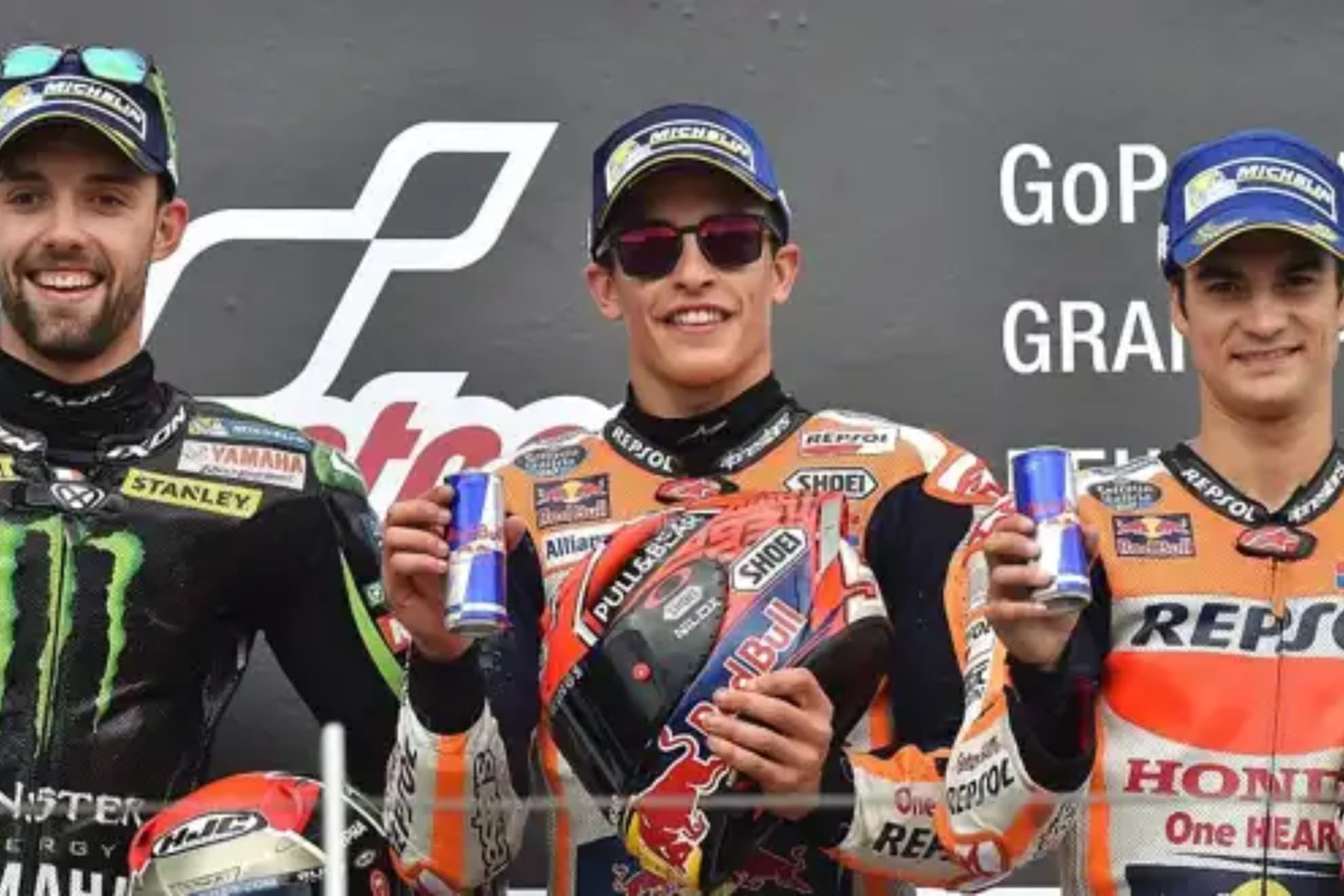 Folger, en el podio de Alemania 2017 con Marc Márquez y Dani Pedrosa.
