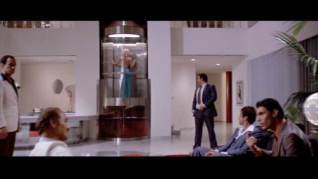 El recordado ascensor de cristal en 'Scarface'.