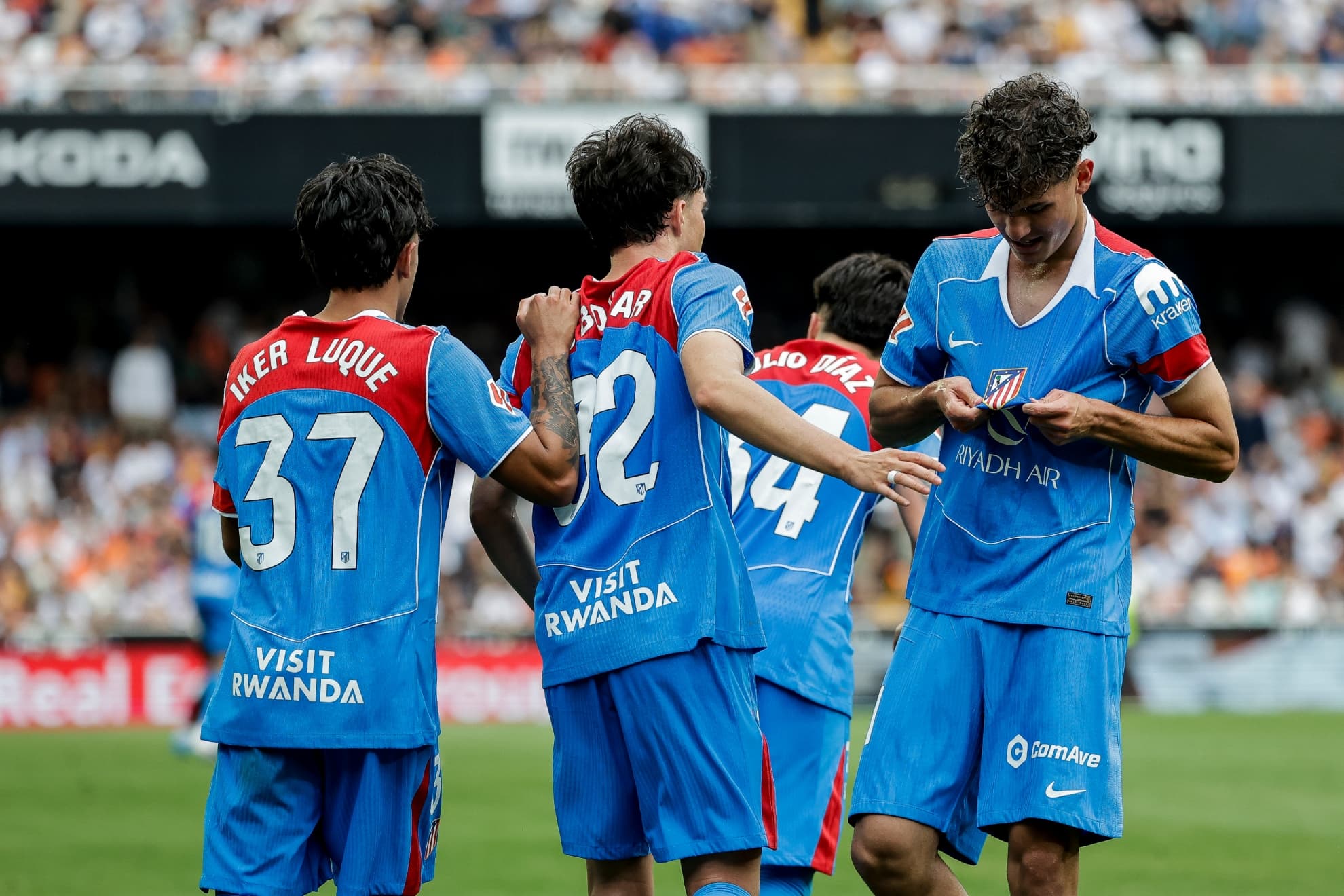 Iker Luque, Boñar y Cubo celebrando un gol del Atlético.