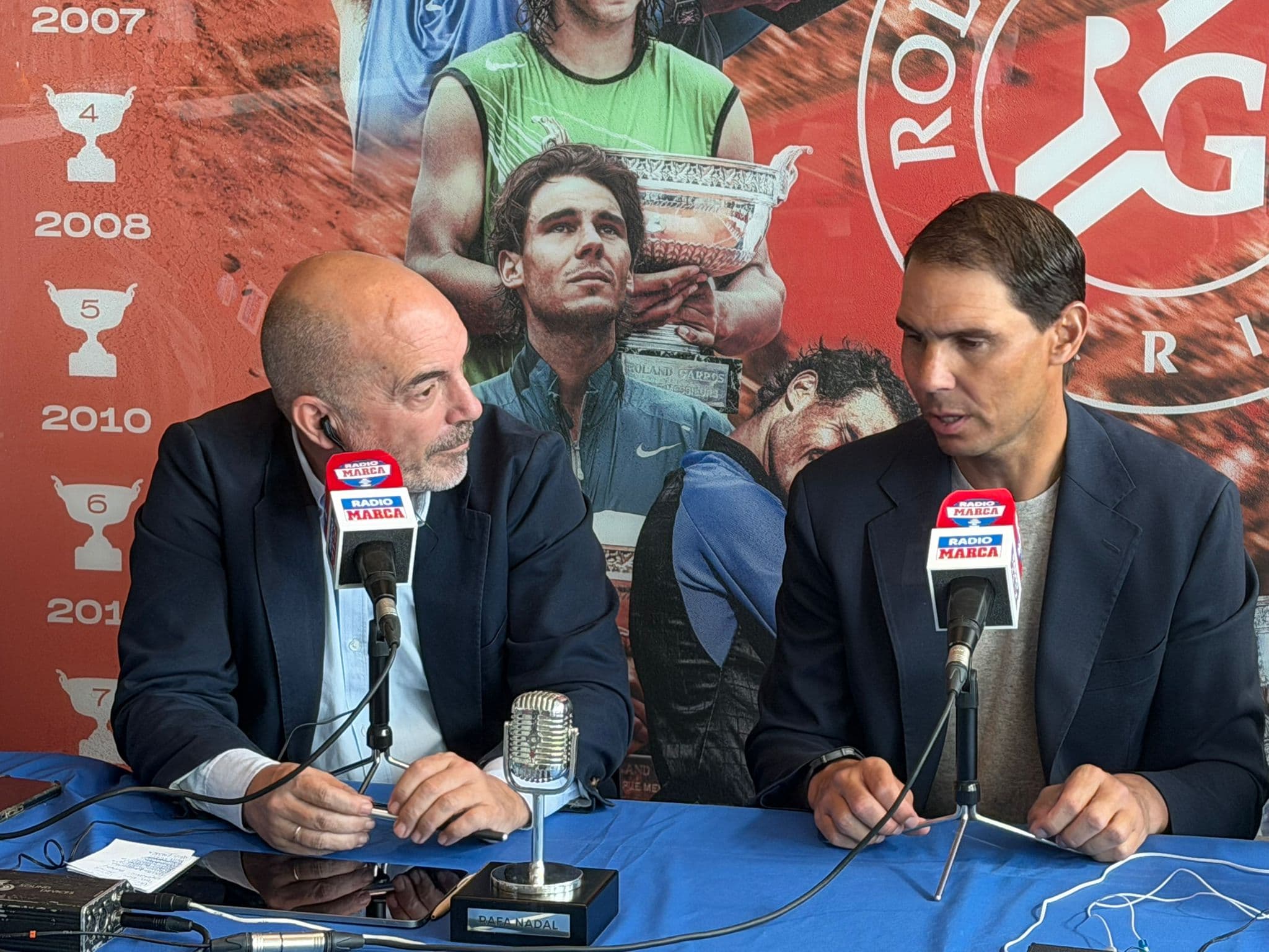 Rafa Nadal, con Raúl Varela.