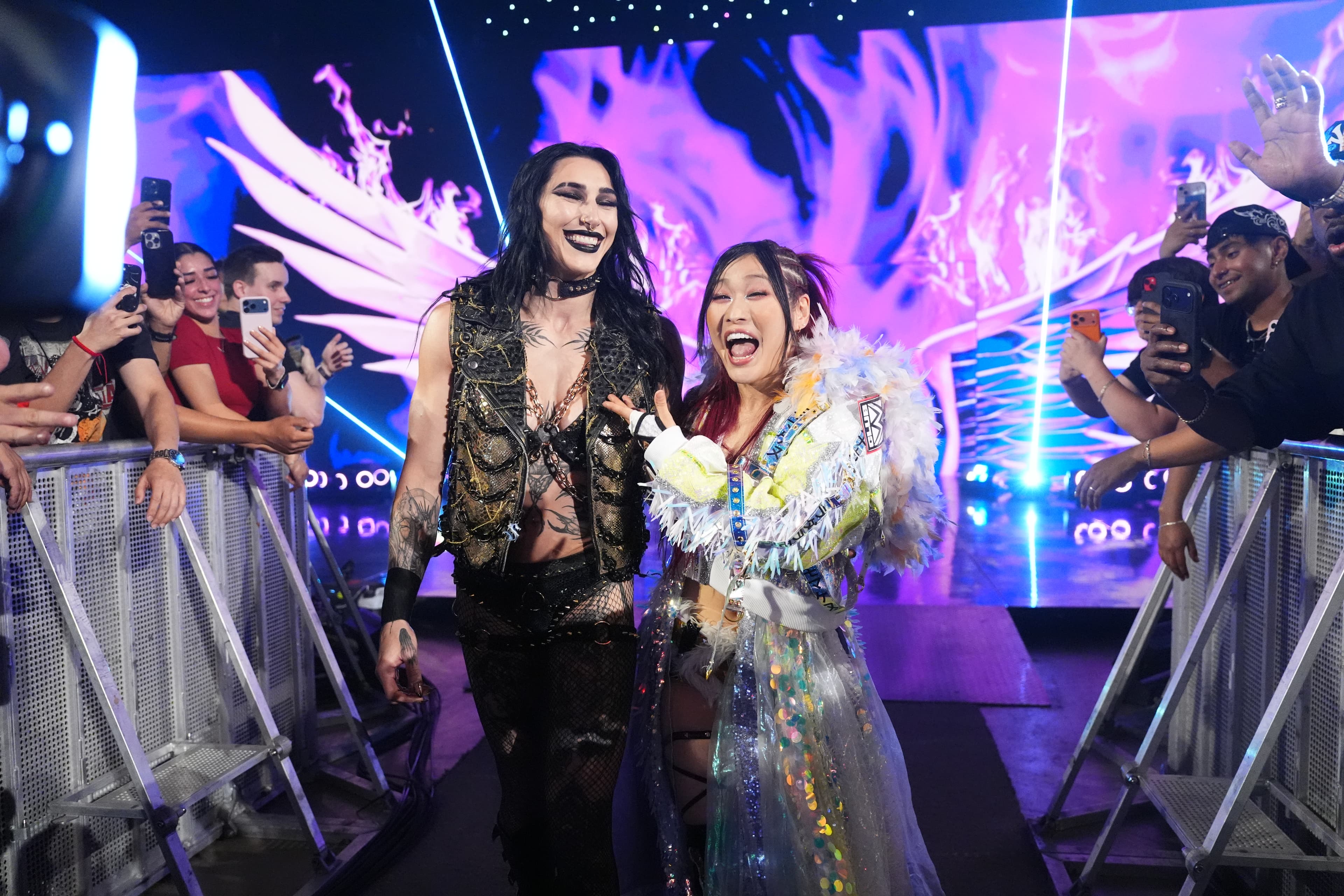 HOUSTON, TEXAS - APRIL 06: Rhea Ripley and Iyo Sky enters the arena during Monday Night RAW at Toyota Center on April 6, 2026 in Houston, Texas. (Photo by Rich Wade/WWE via Getty images)