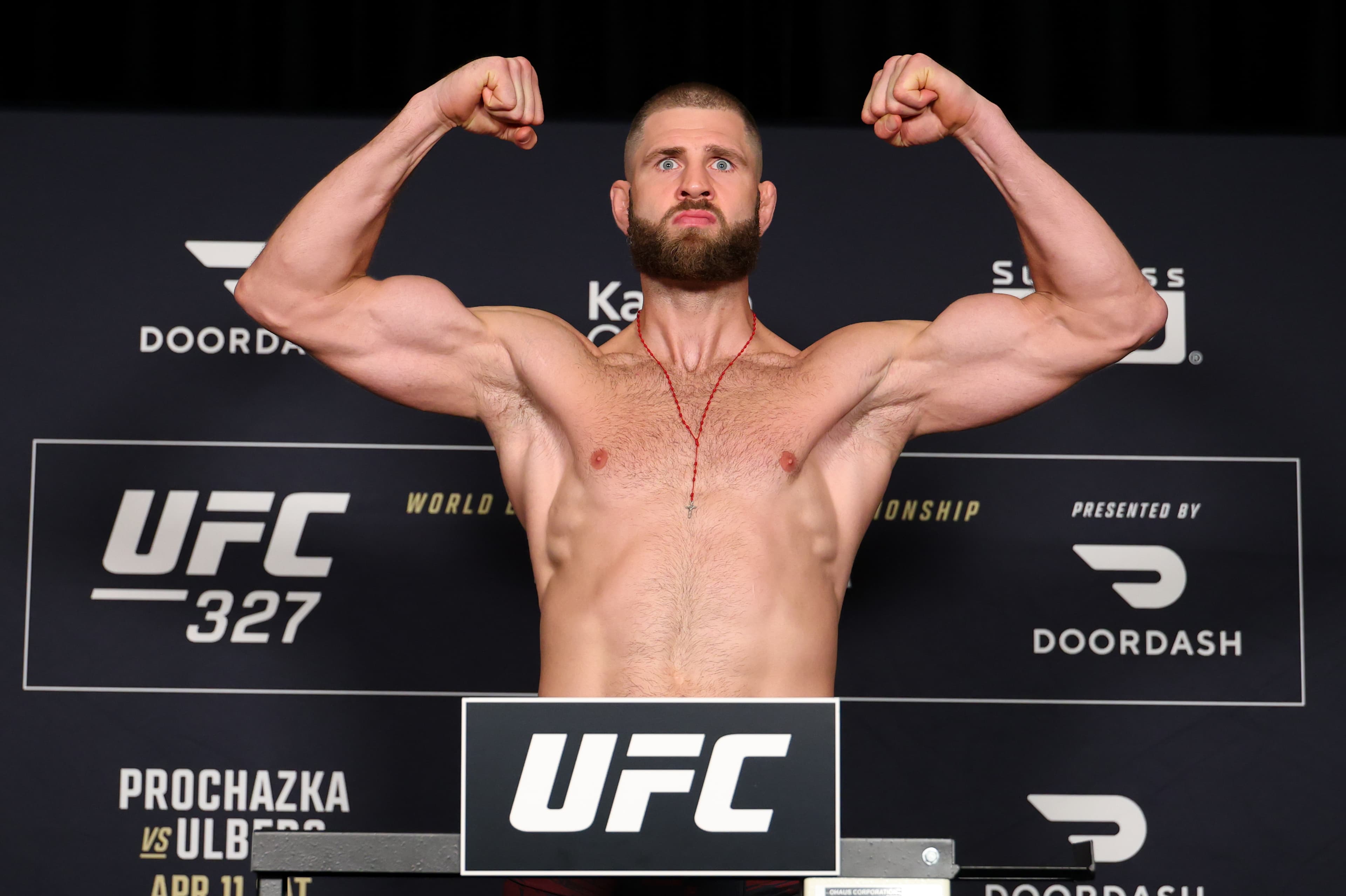 MIAMI, FLORIDA - APRIL 10: Jiri Prochazka poses on the scale at the UFC 327 official weigh-in at Hilton Miami Downtown on April 10, 2026 in Miami, Florida.  (Photo by Ed Mulholland/Zuffa LLC)