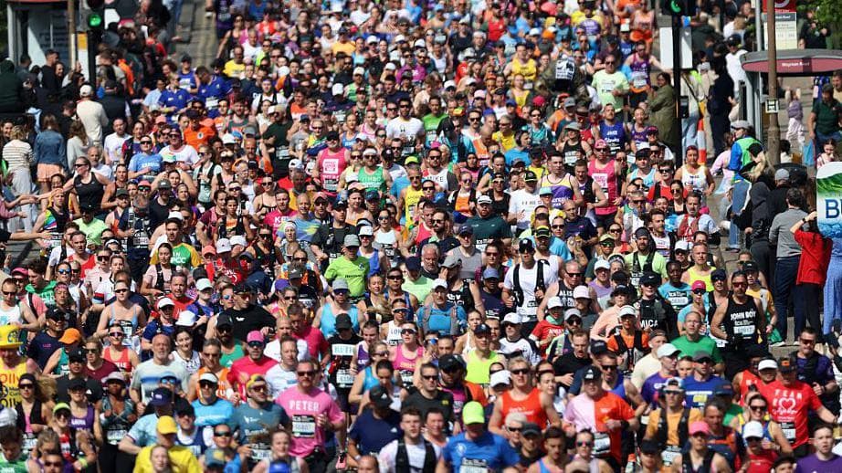 Record breakers and finish line proposals: London Marathon in pictures