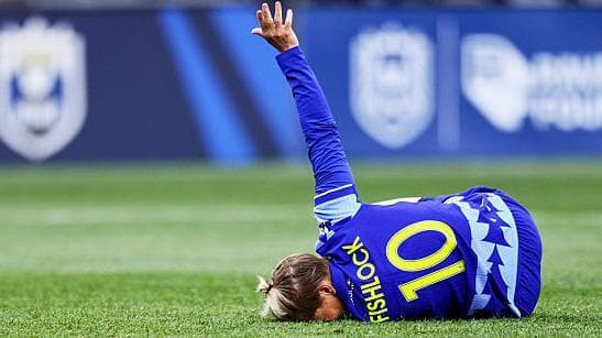 Fishlock awaits injury news after stretcher exit