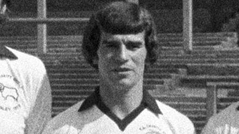 Tributes paid to 'tenacious' title-winning footballer