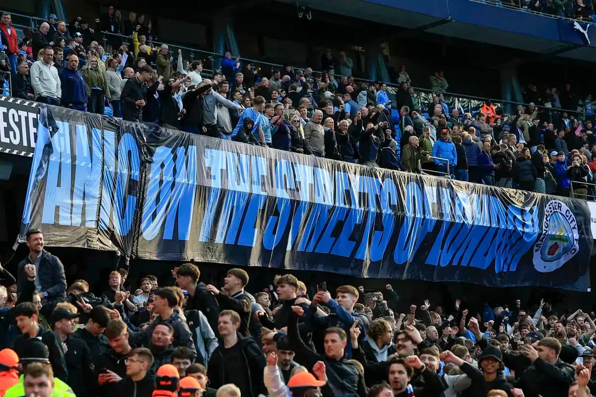 Manchester City fans use 115 charges banner to taunt Arsenal after Etihad victory