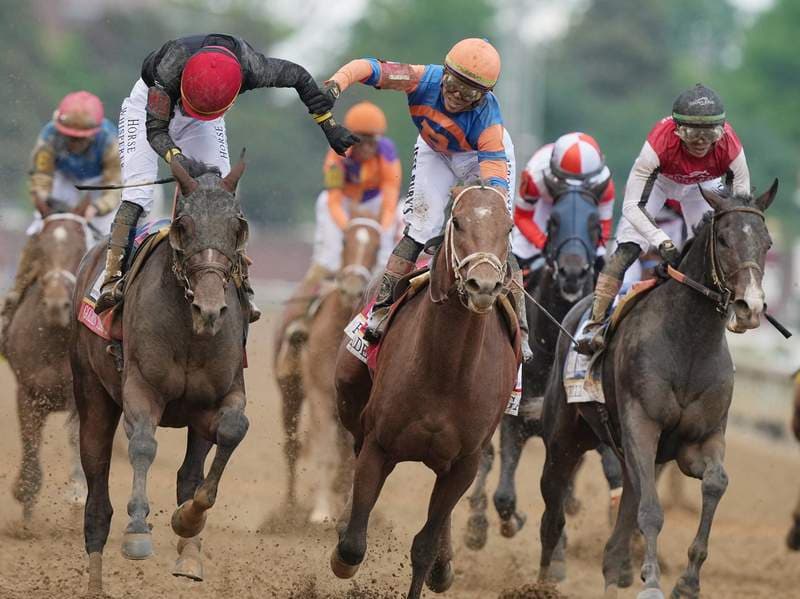 Billionaire Pushes Away 12th Failed Attempt to Tend to Emotional Jockey at Kentucky Derby