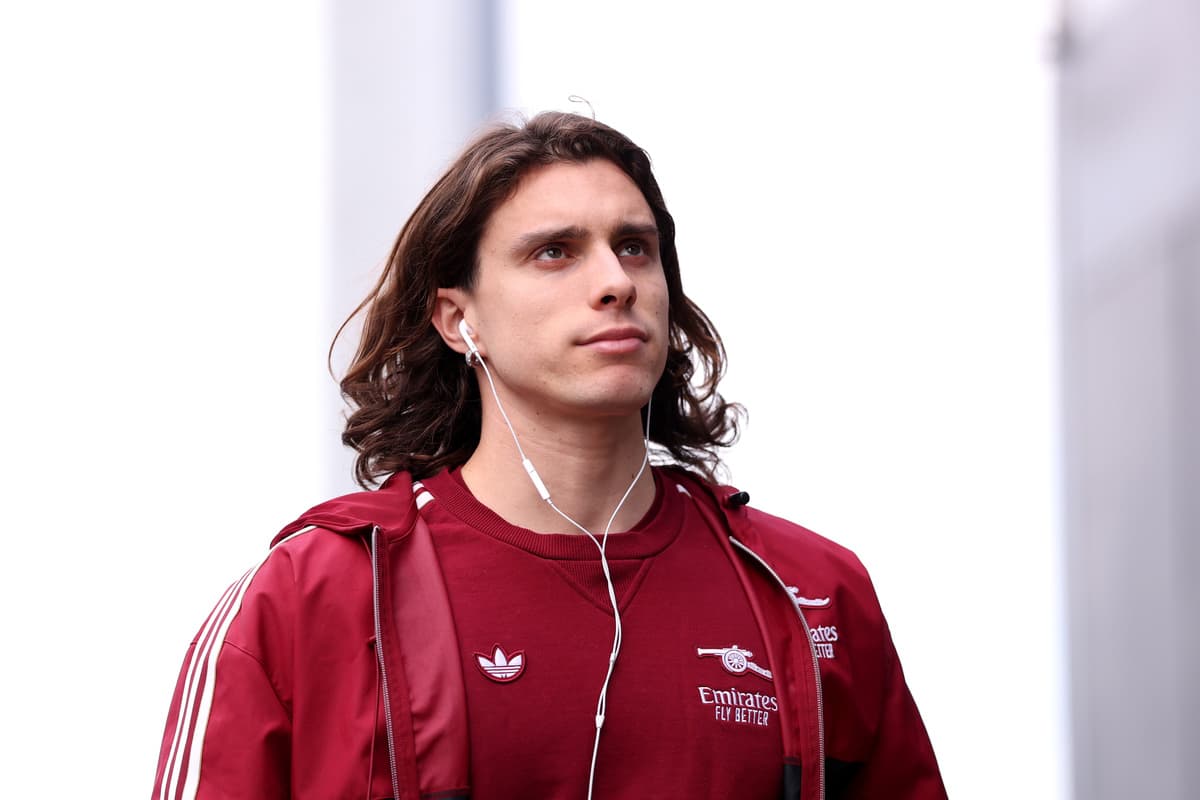 Calafiori celebrates with Arsenal teammates as absence vs. Sporting CP explained