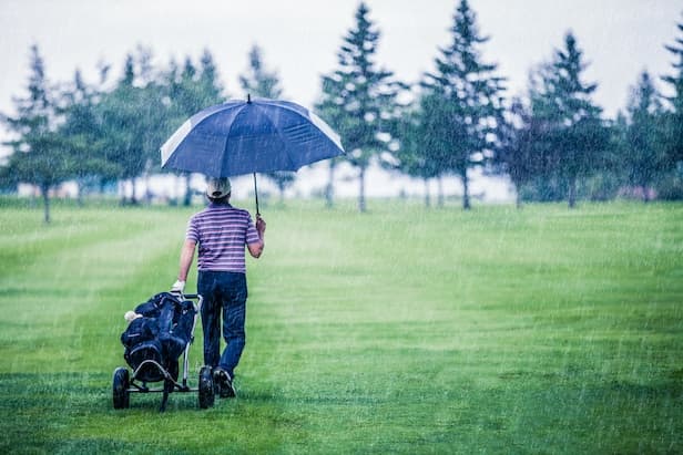 Rules of Golf Review: On a rainy day, what can and can't I do to keep my hands dry?