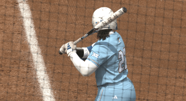 KU softball walks it off in extra innings to clinch Iowa State series