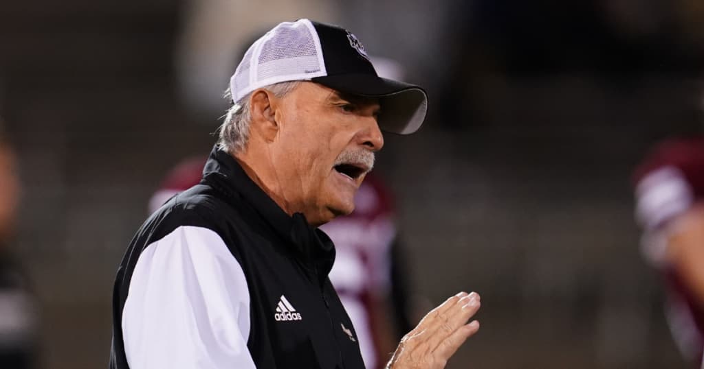 Former UMass head football coach Don Brown now a high school baseball assistant