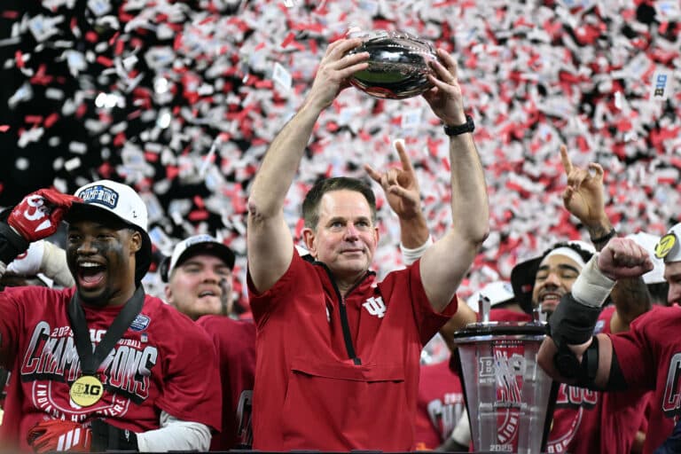 Coaches vote for key college football playoff, postseason changes