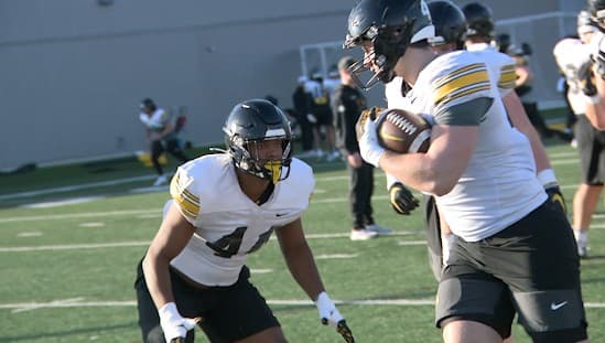 Young Iowa defensive linemen are eager to make a difference