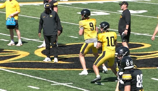 Iowa players, coaches discuss growth of potential starting quarterbacks