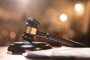 Former high school football player pleads guilty in helmet attack after game