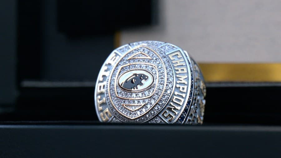 Dewitt football celebrates receiving state championship rings