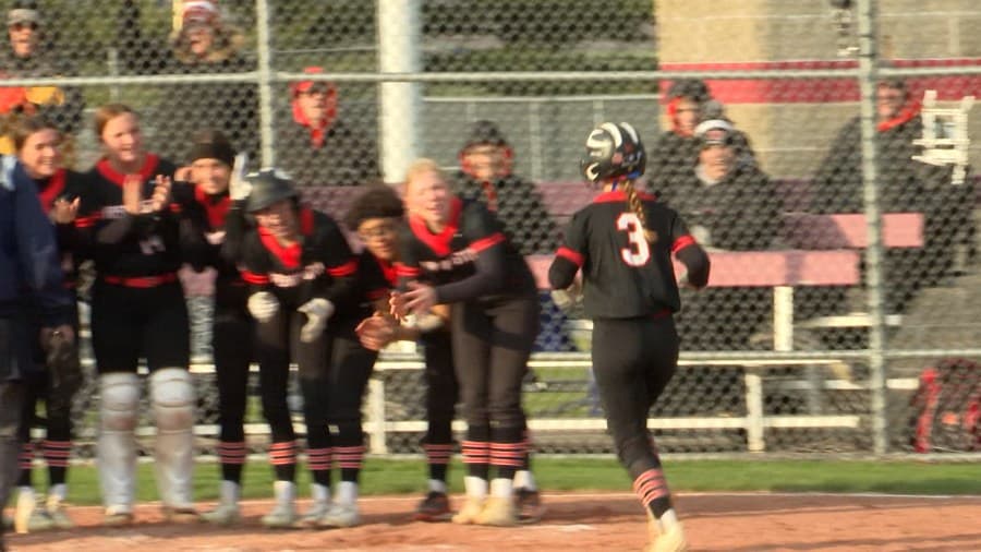 Extra Effort: Washington softball’s Tara Alois carries tune, multiple instruments with ease