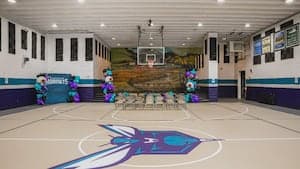 ‘A Carolinas team’: Hornets cut ribbon at renovated community center following Helene damage