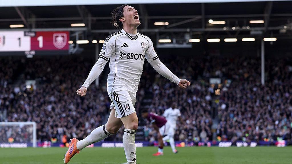 Harry Wilson runs in celebration after a goal for Fulham