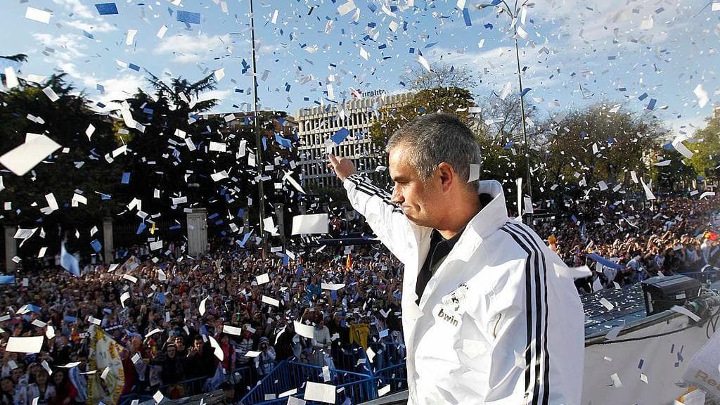 Jose Mourinho of Real Madrid waves during their victory parade