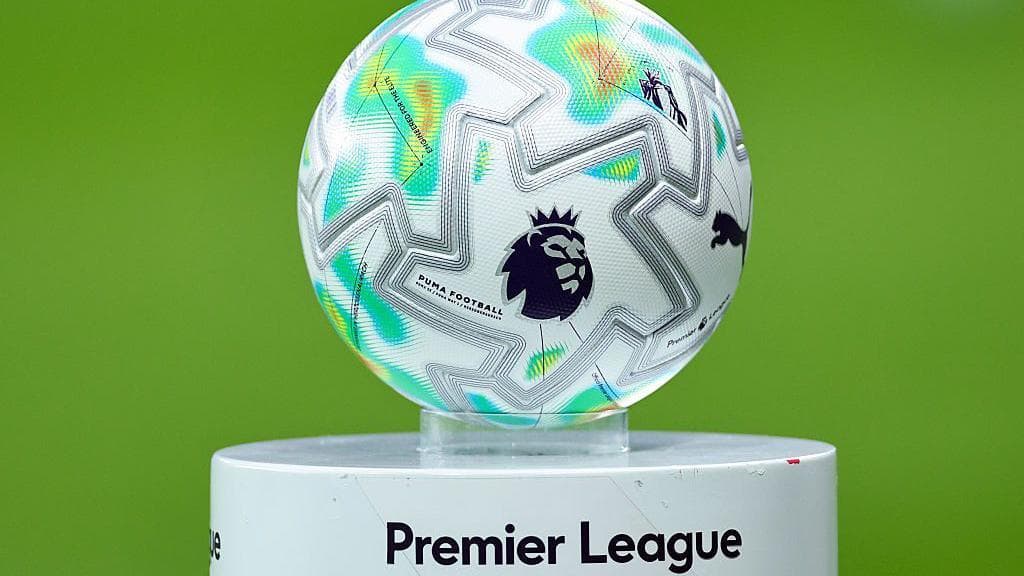 A Premier League branded ball on top of a Premier League branded plinth