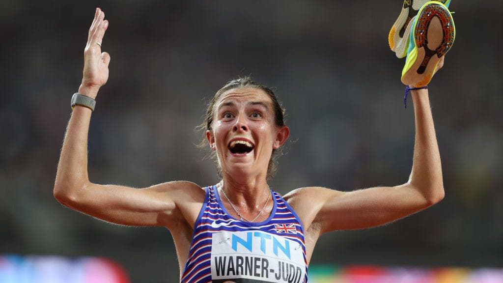 Jess Warner-Judd celebrates after placing eighth in the women's 10,000m final at the World Athletics Championships in Budapest in 2023