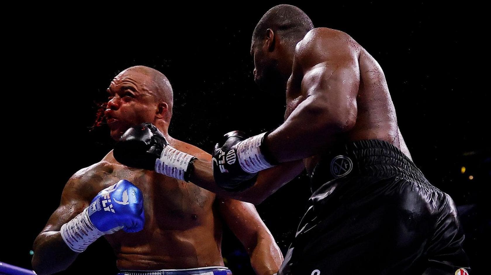 Daniel Dubois lands a punch on a bloody Fabio Wardley