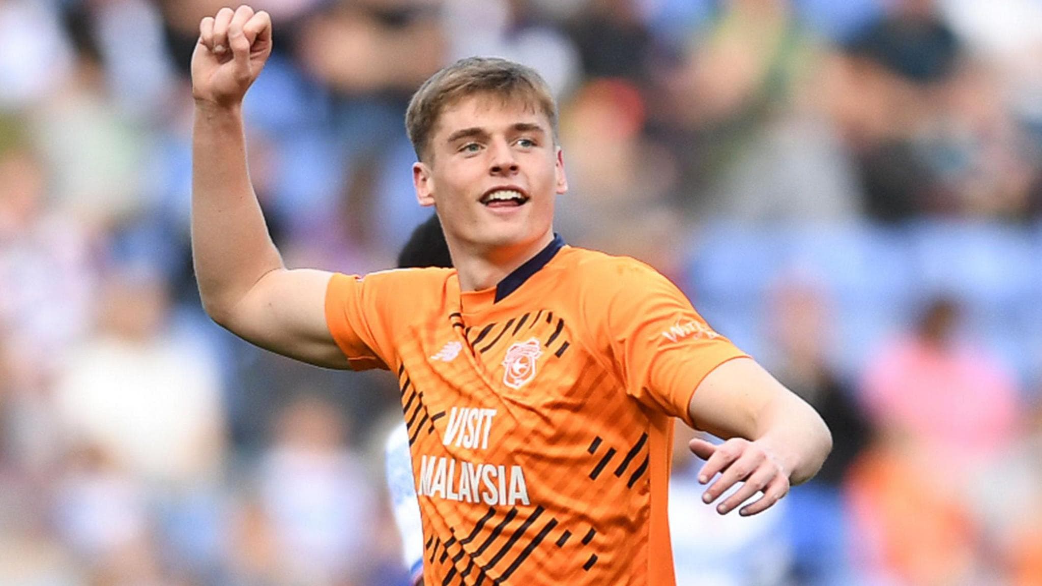 Dylan Lawlor celebrates Cardiff's promotion