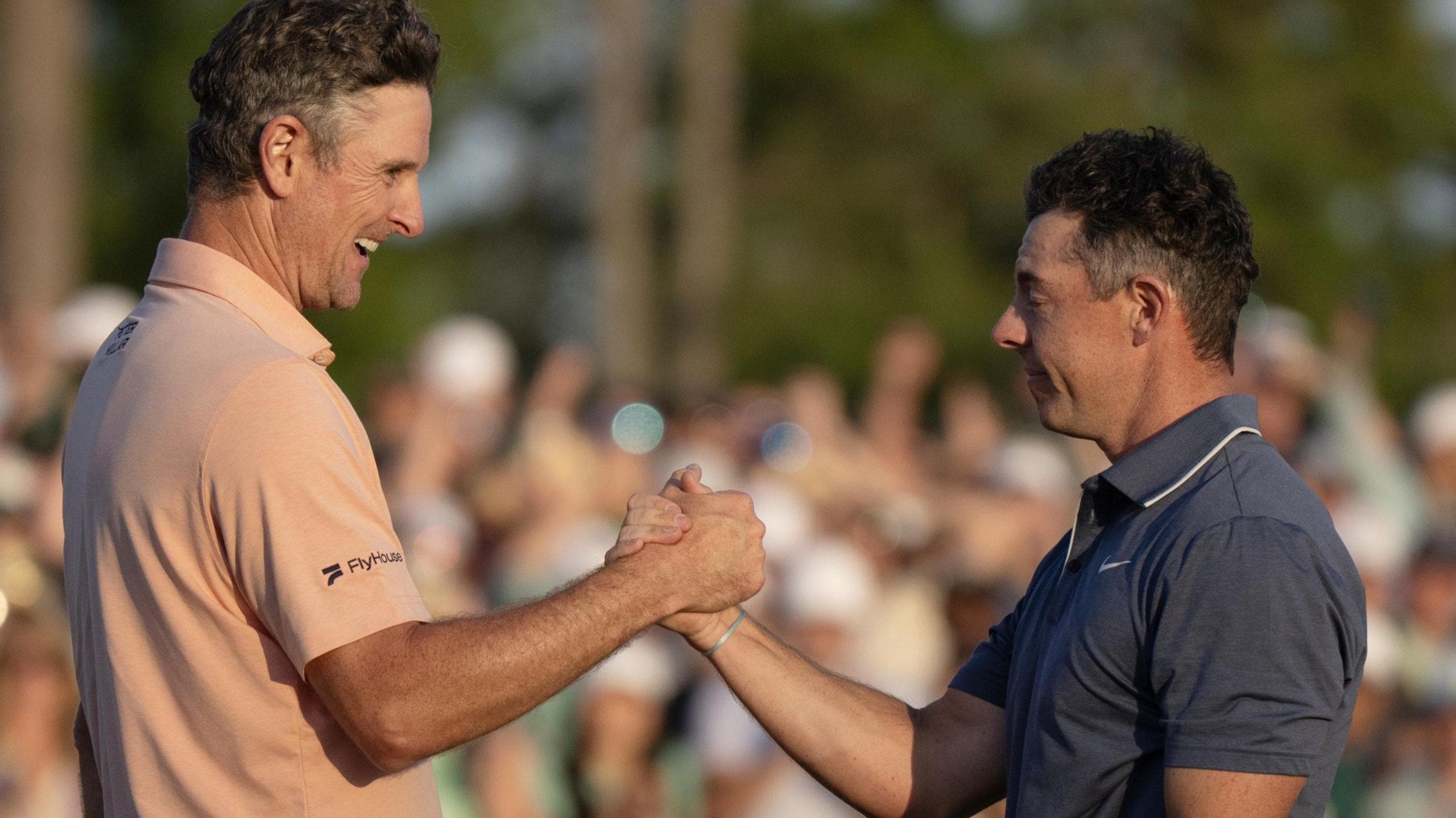 Justin Rose congratulates Rory McIlroy on his victory at the 2025 Masters