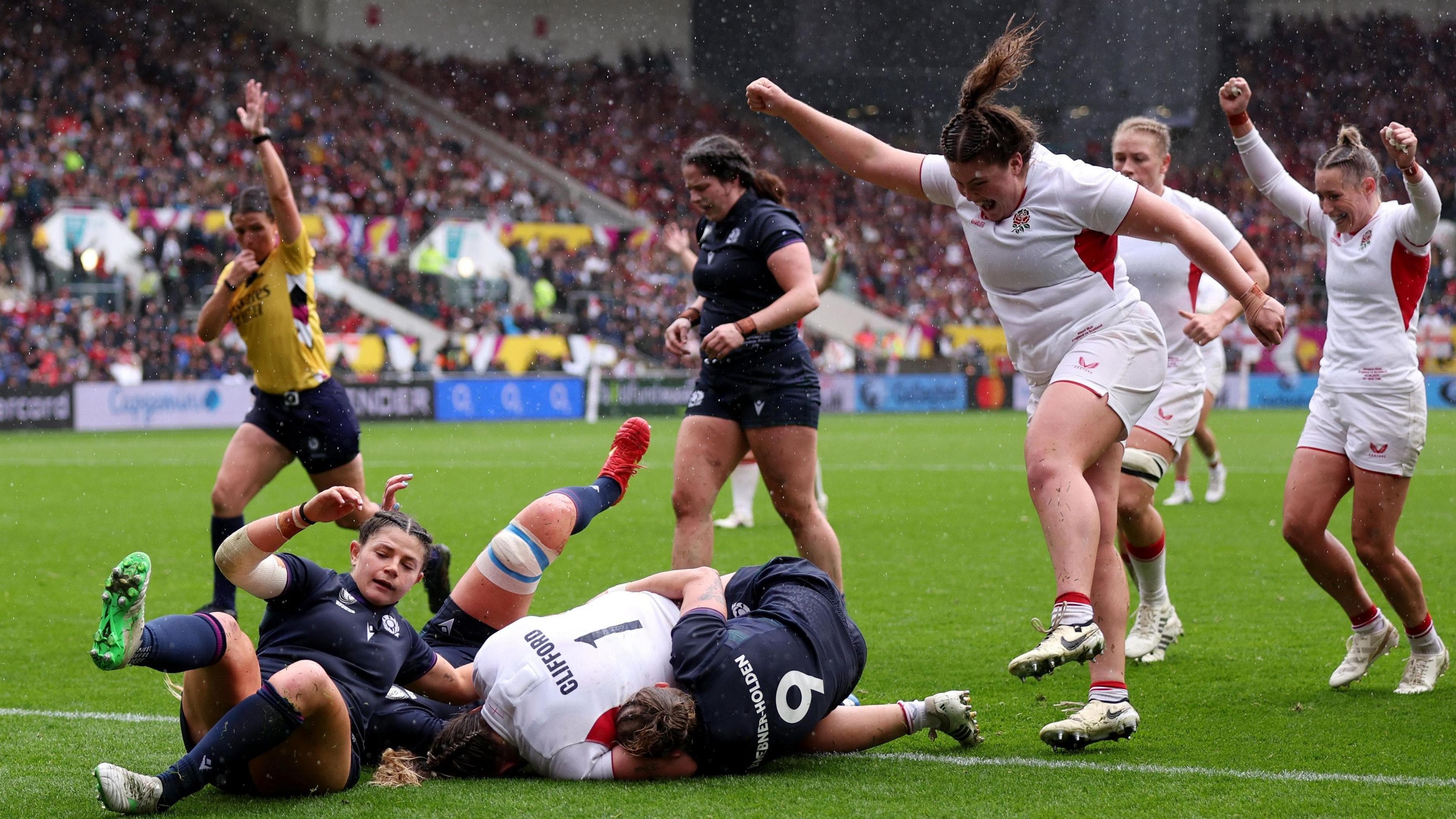 Kelsey Clifford scores a try for England against Scotland