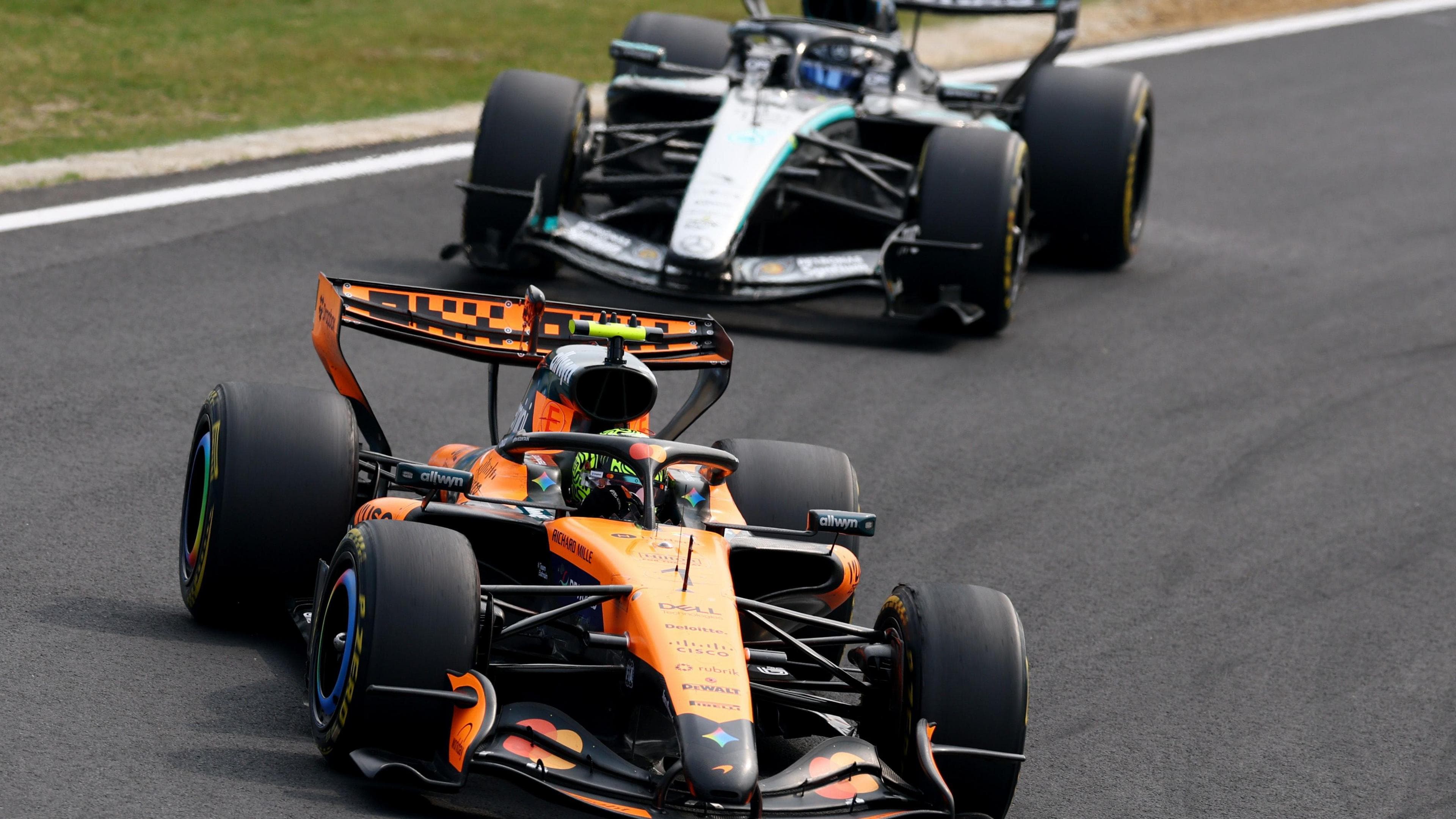 McLaren's Oscar Piastri with Mercedes' George Russell behind him during the Japanese Grand Prix