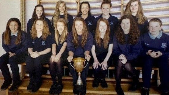Meg Jones as part of a school hockey team photo