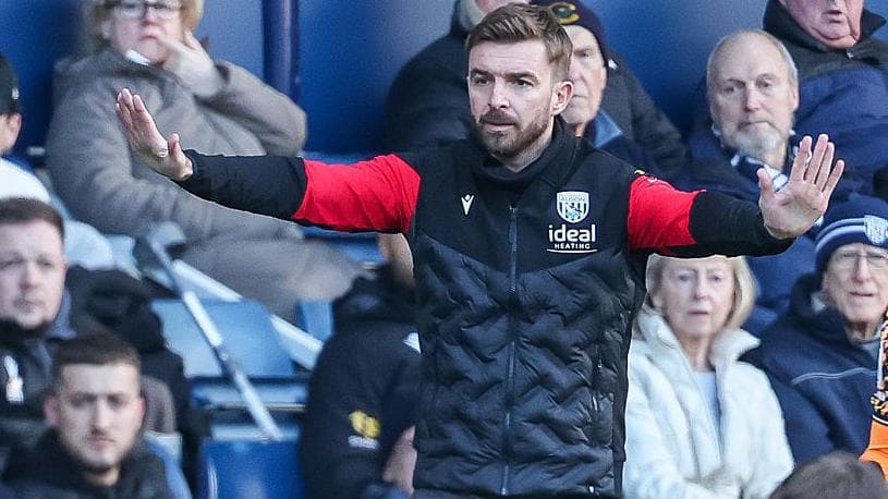 James Morrison gesticulates to his players from the sidelines