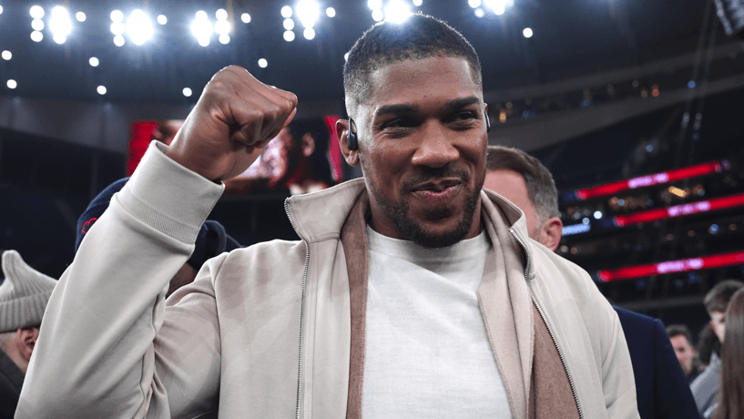 Anthony Joshua puts his fist up