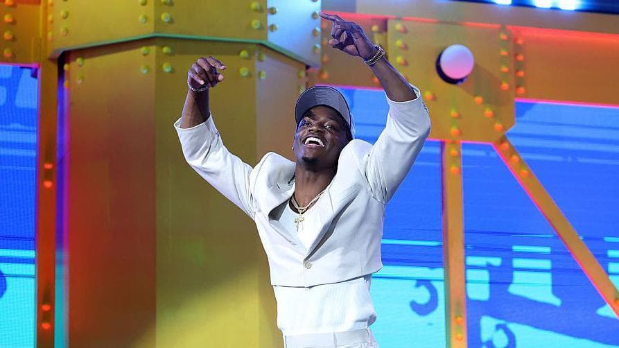 Carnell Tate celebrates after being selected by the Tennessee Titans during the 2026 NFL Draft