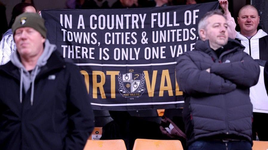 Port Vale fans with a banner that reads: "In a country full of towns, cities & uniteds, there is only one Vale - Port Vale"