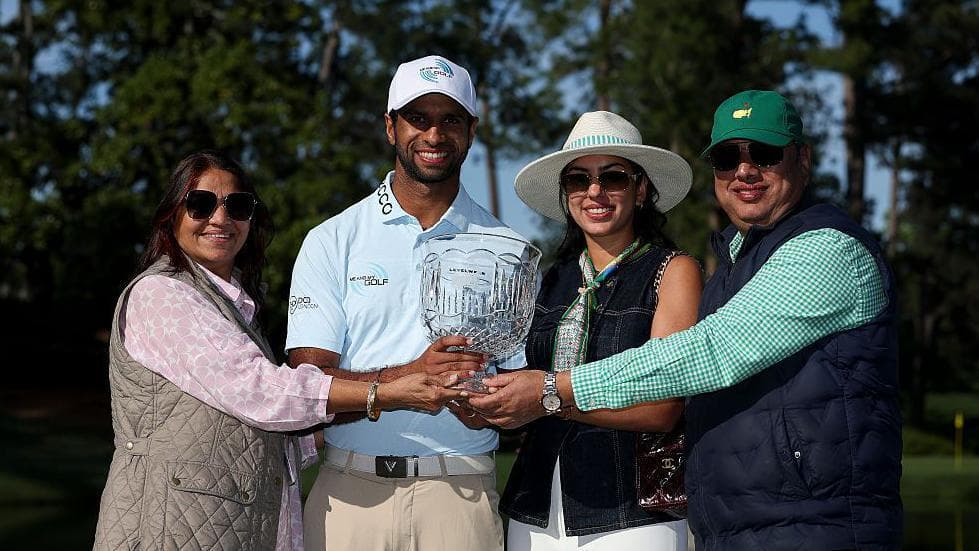 Aaron Rai and his family celebrate winning the Par 3 Contest at the 2026 Masters