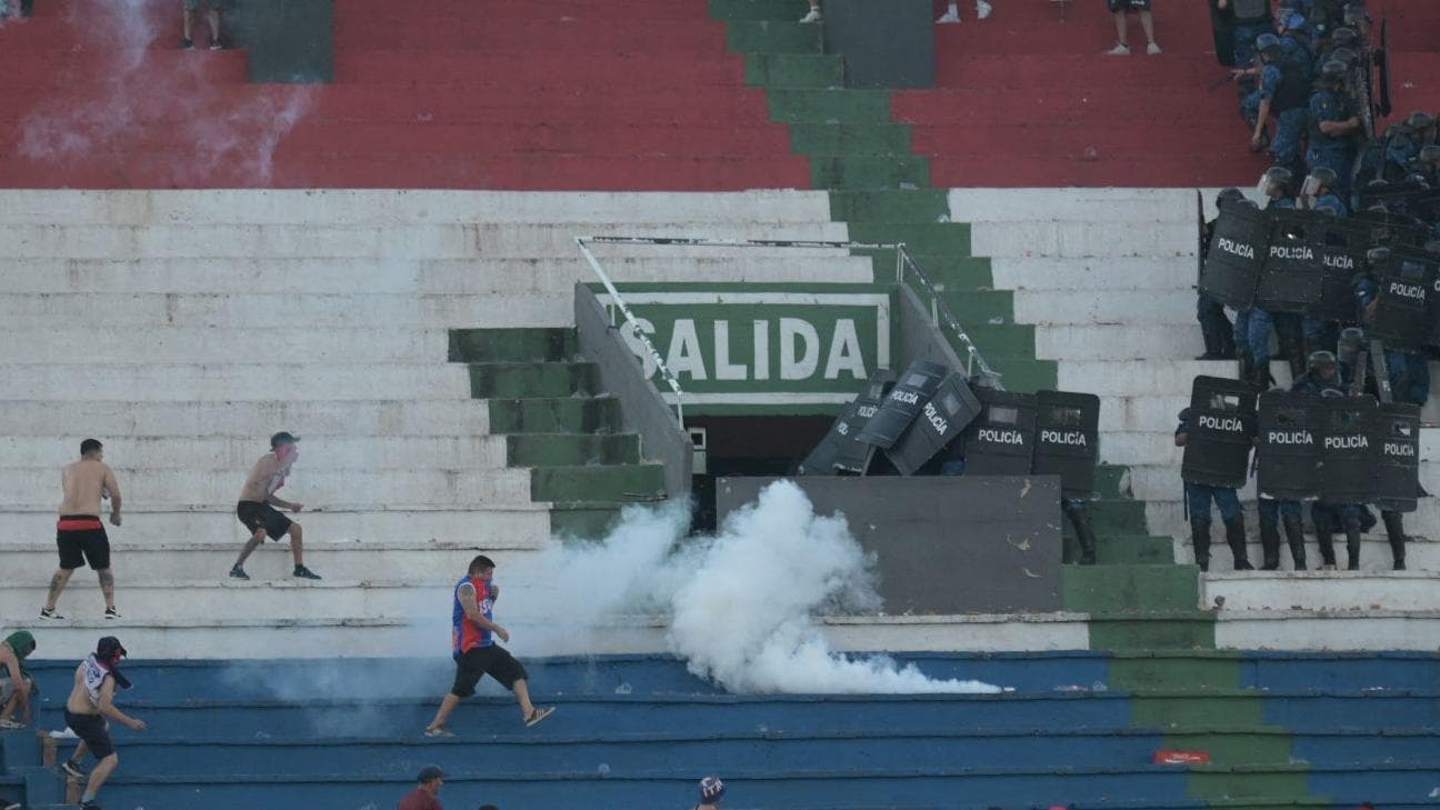 Police fire rubber bullets and detain dozens as Paraguay derby abandoned