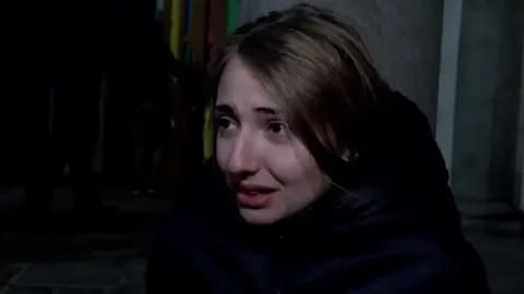 Survivor in tears speaks to camera